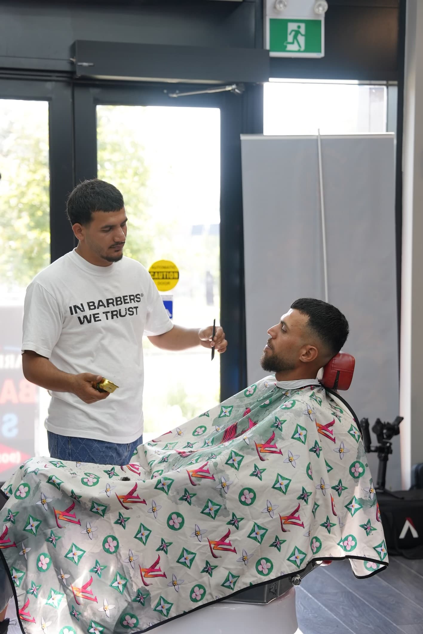 Muhammed consulting with a client at Barberhood York U